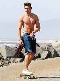 Zac Efron showing muscles