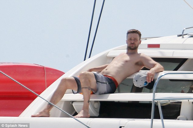 Justin Timberlake Chilling On A Boat, Showing His Pecs