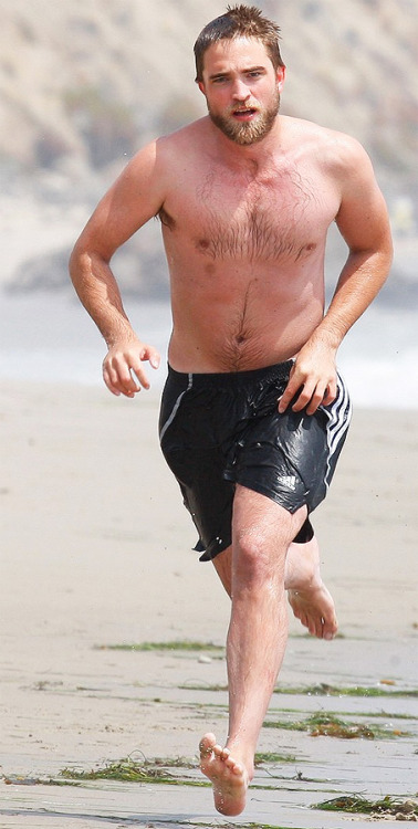 Robert Pattinson on the beach
